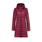 Nyomi - Women's long quilted jacket with hood