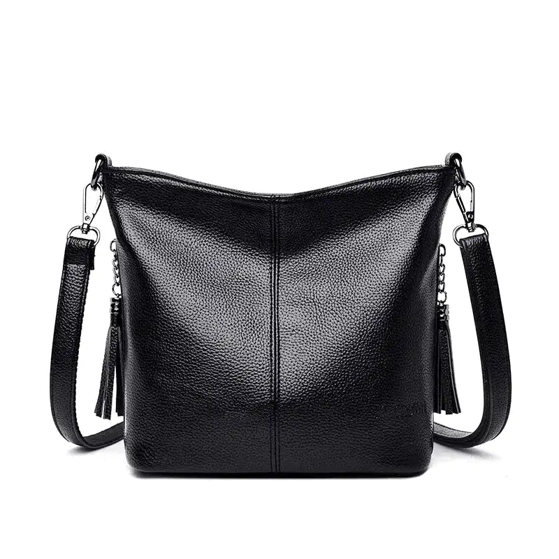 ivette-sac-a-main-bandouliere-en-cuir-rigide-noir-sac-a-main.webp